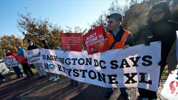 People demonstrate against the proposed Keystone XL pipeline on Nov. 19, 2013 in Washington [AFP]