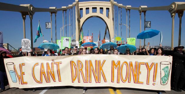 FILE- In this Nov. 3, 2010 file photo, marchers concerned with water pollution protest against hydraulic fracturing and gas well drilling as they cross the Rachel Carson Bridge on their way through town to the Developing Unconventional Gas (DUG) East convention and exhibition being held in Pittsburgh. Pennsylvania officials say there have been 370 complaints so far in 2013 alleging that oil or natural gas drilling polluted or diminished the flow of water to private water wells. But The Associated Press found that a lack of detail in the data make it almost impossible to judge whether the drilling boom is harming more individuals than in the past, or less. Photo: Keith Srakocic, AP / AP
