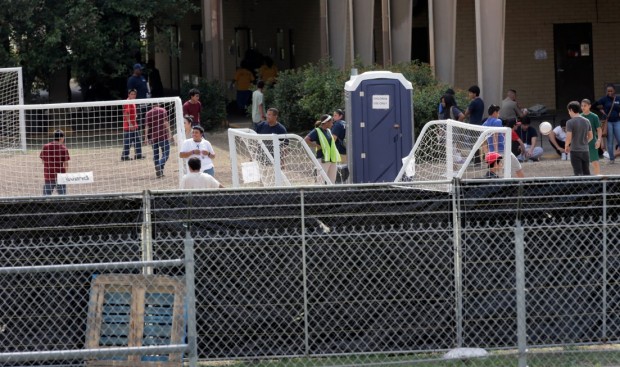 A temporary shelter for unaccompanied minors who have entered the country illegally is seen at Lackland Air Force Base, Monday, June 23, 2014, in San Antonio. U.S. Sen. Ted Cruz, U.S. Rep Michael Bachmann, and Attorney Gen. and Republican gubernatorial candidate Greg Abbott toured the facility Monday. Cruz and Abbott are ramping up criticism of President Barack Obama for more than 52,000 unaccompanied minors who have poured across the southwestern border of the U.S. in recent months. (AP/Eric Gay)