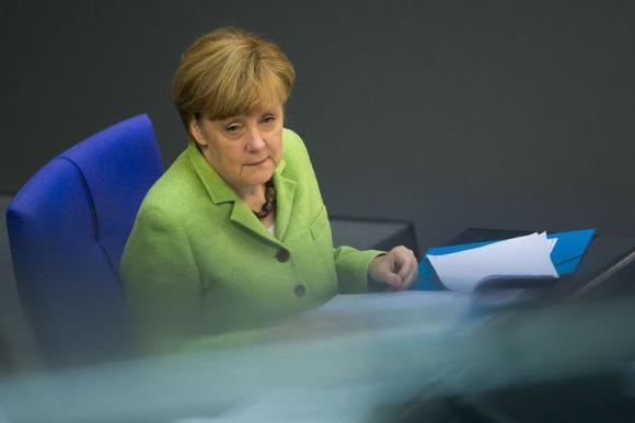 Merkel to push back against EU if green energy support questioned Photo: Thomas Peter