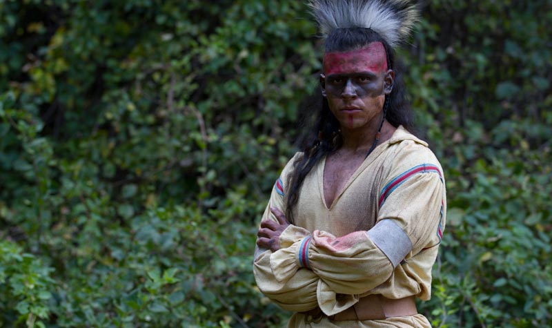 Caption from aloneyetnotalone.com: 'Galasko (Ozzie Torres), the son of the Delaware chief, looks noble in his warrior dress.'