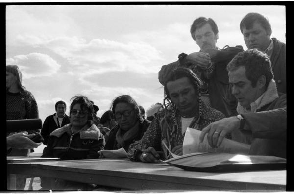 Kevin McKiernan stands with his camera behind AIM leader Russell Means. (Kevin McKiernan)
