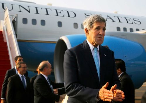 U.S. Secretary of State John Kerry arrives at the airport in Jakarta, Indonesia, on Monday Oct. 20, 2014, for the inauguration of new Indonesian President Joko "Jokowi" Widodo and meetings with other regional leaders. Kerry is in Indonesia for a brief visit aimed at building Asian support for the fights against Islamic State extremists and the deadly Ebola virus. Photo: Brian Snyder, AP / Pool Reuters