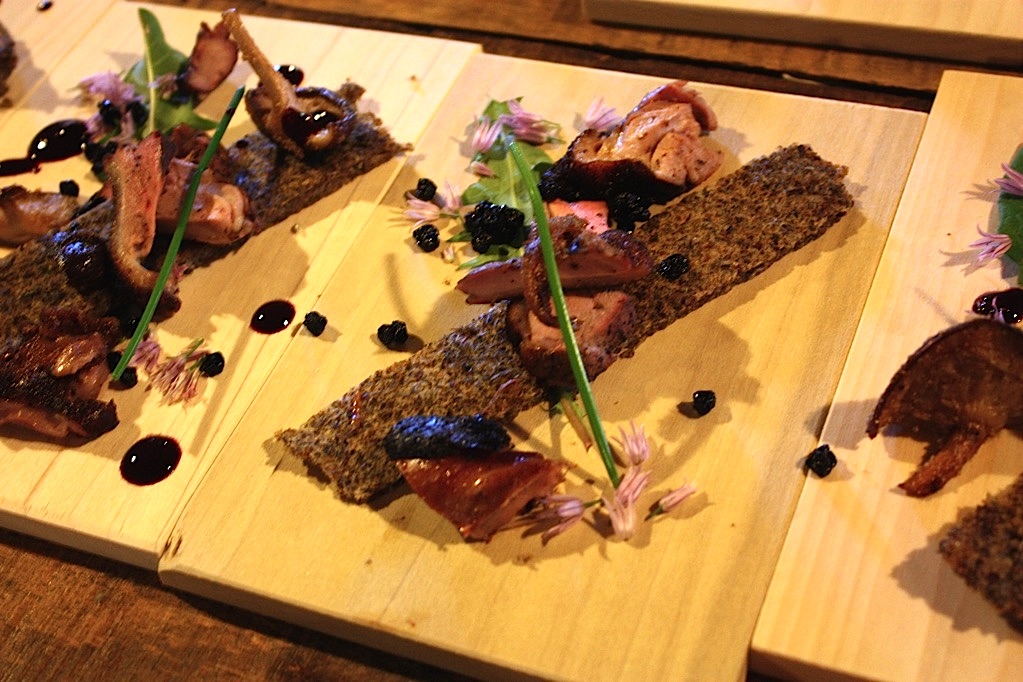 Shown on this plate is wild rice flatbread, grilled duck, dandelion, dried blueberry and forest mushroom. (Sean Sherman)