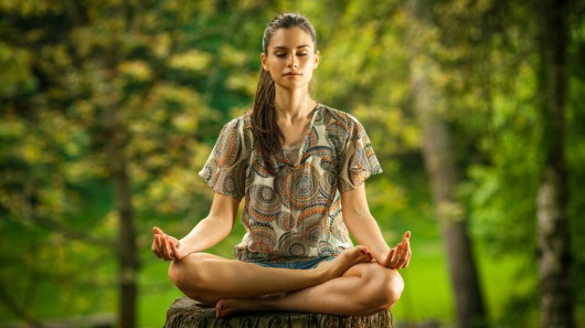 A new study explains how mediation and yoga can reduce the perception of pain (Photo: Shut...