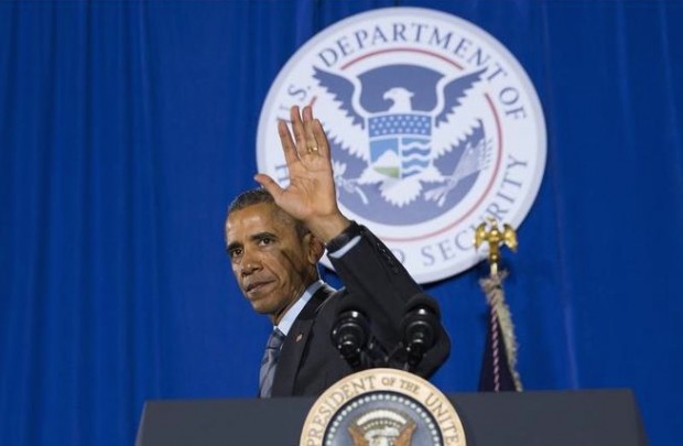 President Barack Obama waves after delivering remarks at the Department of Homeland Security on his FY2016 budget proposal, on Monday, Feb. 2, 2015, in Washington. Obama warned congressional Republicans Monday that he won't accept a spending plan that boosts national security at the expense of domestic programs for the middle class. (AP Photo/Evan Vucci)