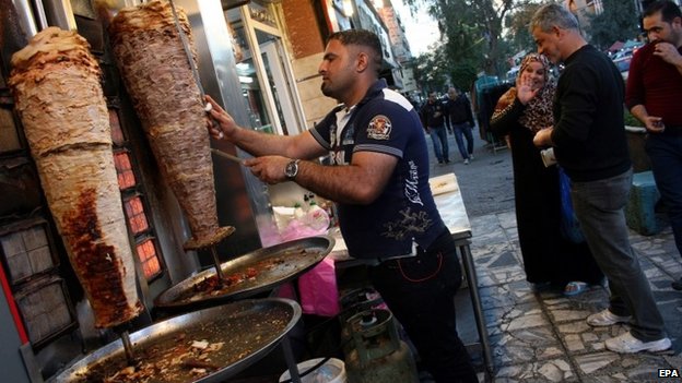 An Iraqi vendor sells Shawarma at a restaurant in central Baghdad, Iraq, 05 February 2015