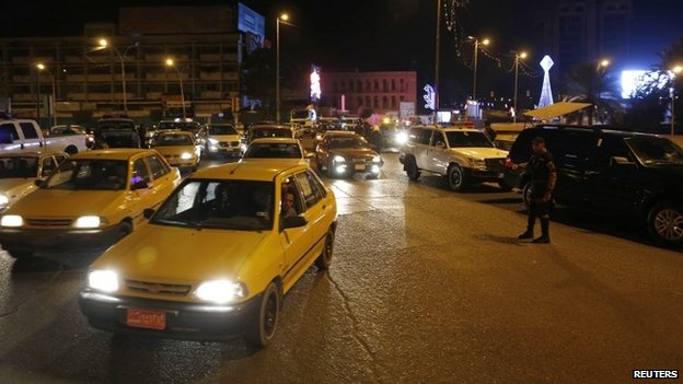 Vehicles are seen on a street in Baghdad February 8, 2015