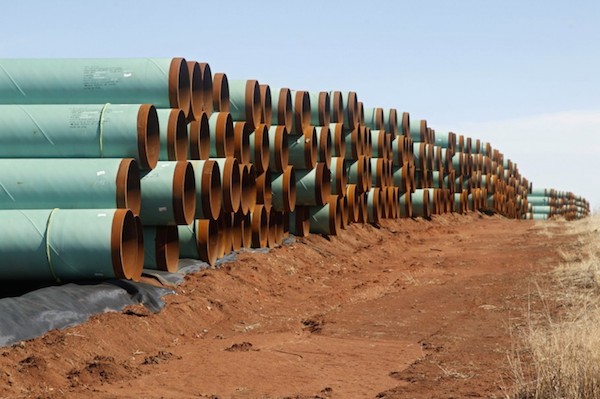 Piles of Keystone XL pipeline awaiting assembly in Cushing, Oklahoma. (Sue Ogrocki/AP)
