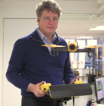 Parrot CEO Henri Seydoux flies Bebop drone in his office