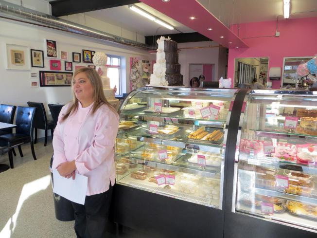 In this Jan. 20, 2015, photo, bakery owner Marjorie Silva stands for a photo inside her own Azucar Bakery, in Denver. Silva is facing a discrimination complaint with Colorados Civil Rights Division because she refused to write hateful words about gays on a cake for a customer.
