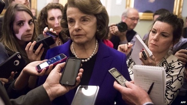 Senate intelligence committee chairwoman Dianne Feinstein speaks to reporters at the US Capitol in Washington - 9 December 2014