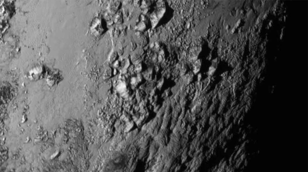 High resolution image showing mountains on the surface of Pluto