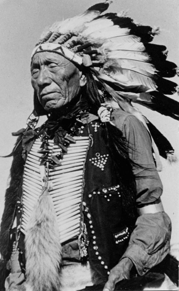 1937 Nicholas Black Elk in chief's costume. Beginning in 1934, Black Elk returned to the work that he had done earlier in life with Buffalo Bill  organizing an Indian show in the Black Hills. Unlike the Wild West shows which were used to glorify Indian warfare, Black Elk's show was used primarily to teach tourists about Lakota culture and traditional sacred rituals  including the Sun Dance. [Wikipedia]