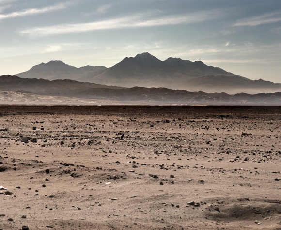 The coastal desert of Peru, with the Andean highlands visible in the distance. Near Camana, Peru, 2014. Photo by Doug McMains, National Museum of the American Indian, Smithsonian Institution