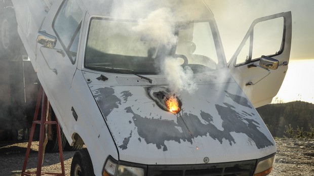 This truck was more than a mile away, but Lockheed Martin recently demonstrated how its ATHENA weapons system, a powerful laser system, could still burn through its engine in a matter of seconds. (Photo credit: Lockheed Martin)