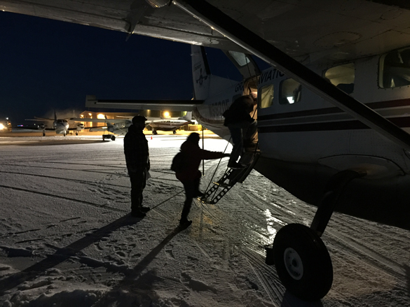 Members of the Calricaraq trauma response team board a 9-person plane to visit a family in the village. (Mary Annette Pember)