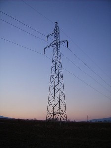 Transmission tower supporting high-voltage electrical transmission cables.