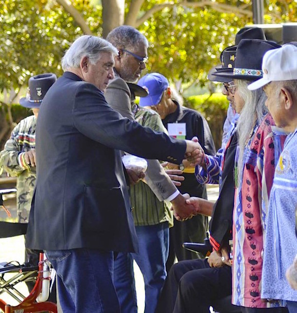 Rincon Tribal Chairman Bo Mazzetti and California Veterans Secretary Todd Irby were among hundreds who shook hands and thanked all the veterans in attendance during a special tribute to veterans at California Native American Day. (Photo: Paula Shultz)