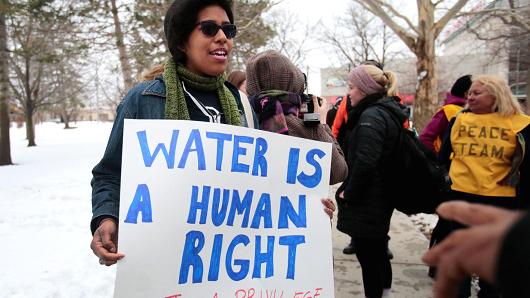 Demonstrators protest over the Flint, Michigan contaminated water crisis, March 6, 2015.