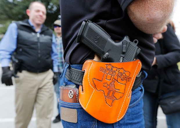 AUSTIN, TX - JANUARY 1: On January 1, 2016, the open carry law took effect in Texas, and 2nd Amendment activists held an open carry rally at the Texas state capitol on January 1, 2016 in Austin, Texas. (Photo by Erich Schlegel/Getty Images) 