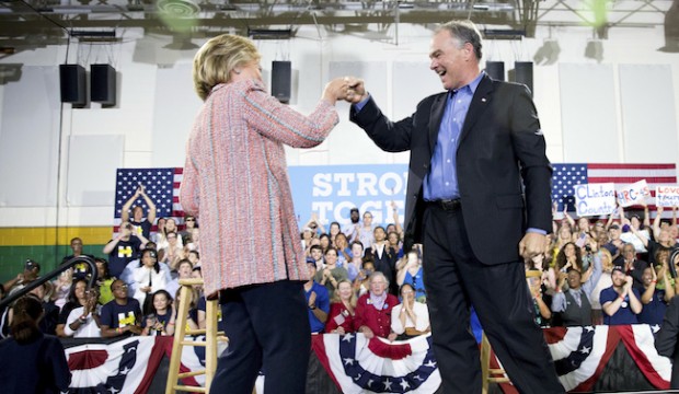 Democratic presidential candidate Hillary Clinton fist bumps Sen. Tim Kaine, D-Va., after speaking at a rally at Northern Virginia Community College in Annandale, Thursday, July 14, 2016. Kaine has been rumored to be one of Clinton's possible vice president choices. (AP Photo/Andrew Harnik)