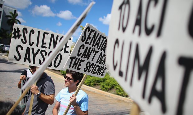 Alexius Marcano and other protesters gather near the office of U.S. Sen. Marco Rubio (R-FL) to ask him to take action to address climate change on August 13, 2013 in Miami, Florida. The event is part of a national movement to inform Congressional members who they say don�t believe in climate change even though a majority of Americans, 97% of climate scientists, NASA, NOAA and the National Academy of Sciences all say a change is happening in the climate.