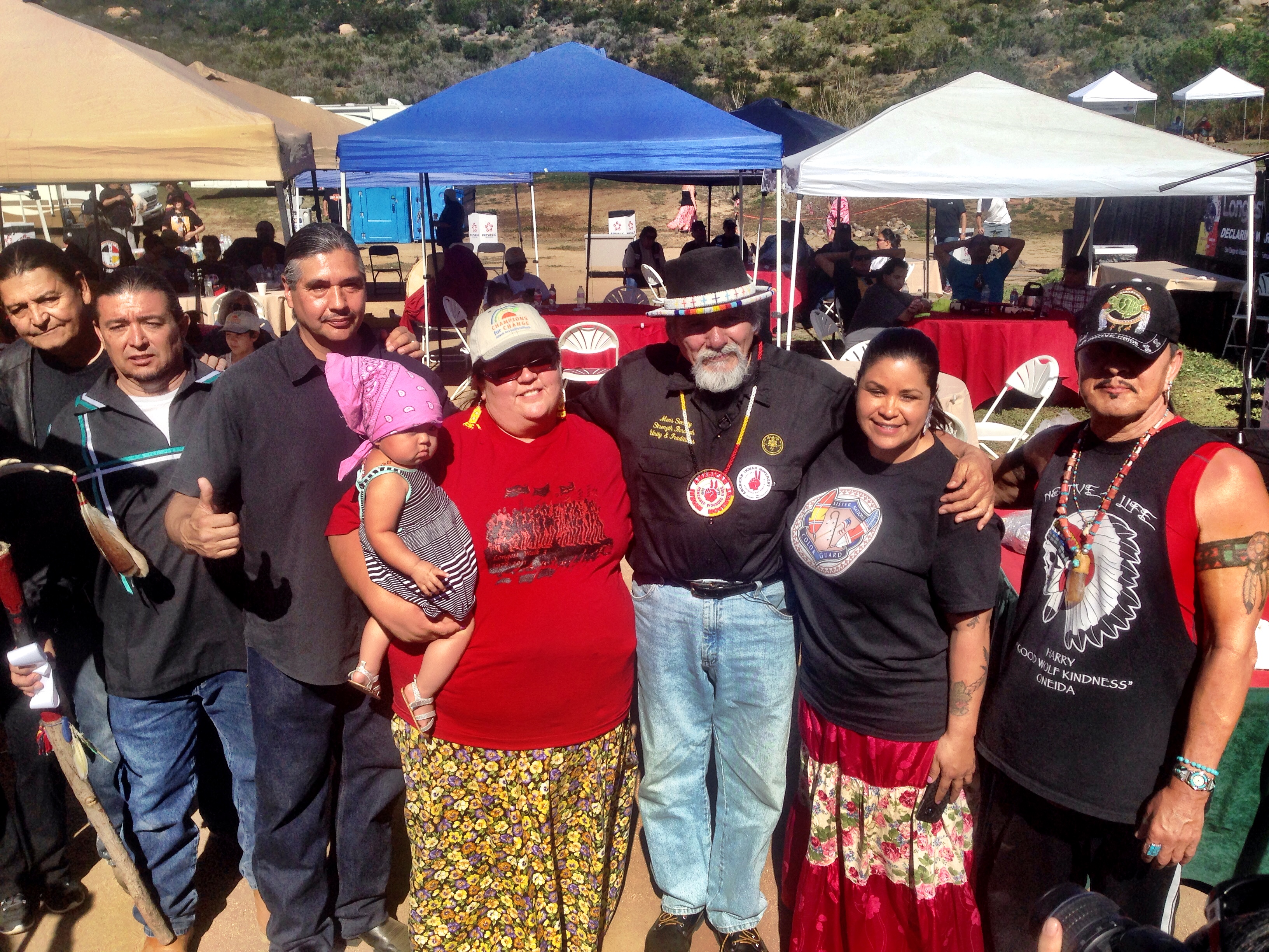 Dennis Banks surrounded by members of various California tribes from San Diego. Chief Harry Loving Kindness is on the far right and Orlando Vigil, National Coordinator is on the far left. The woman to Denniss right is Sherry LaBrake, coordinator from Sycuan Reservation, and the woman to his left is her assistant coordinator. (Courtesy Haig Born)