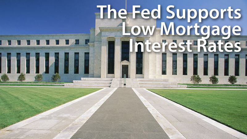 The Fed raises the Fed Funds Rate, pledges support for low mortgage rates into 2016