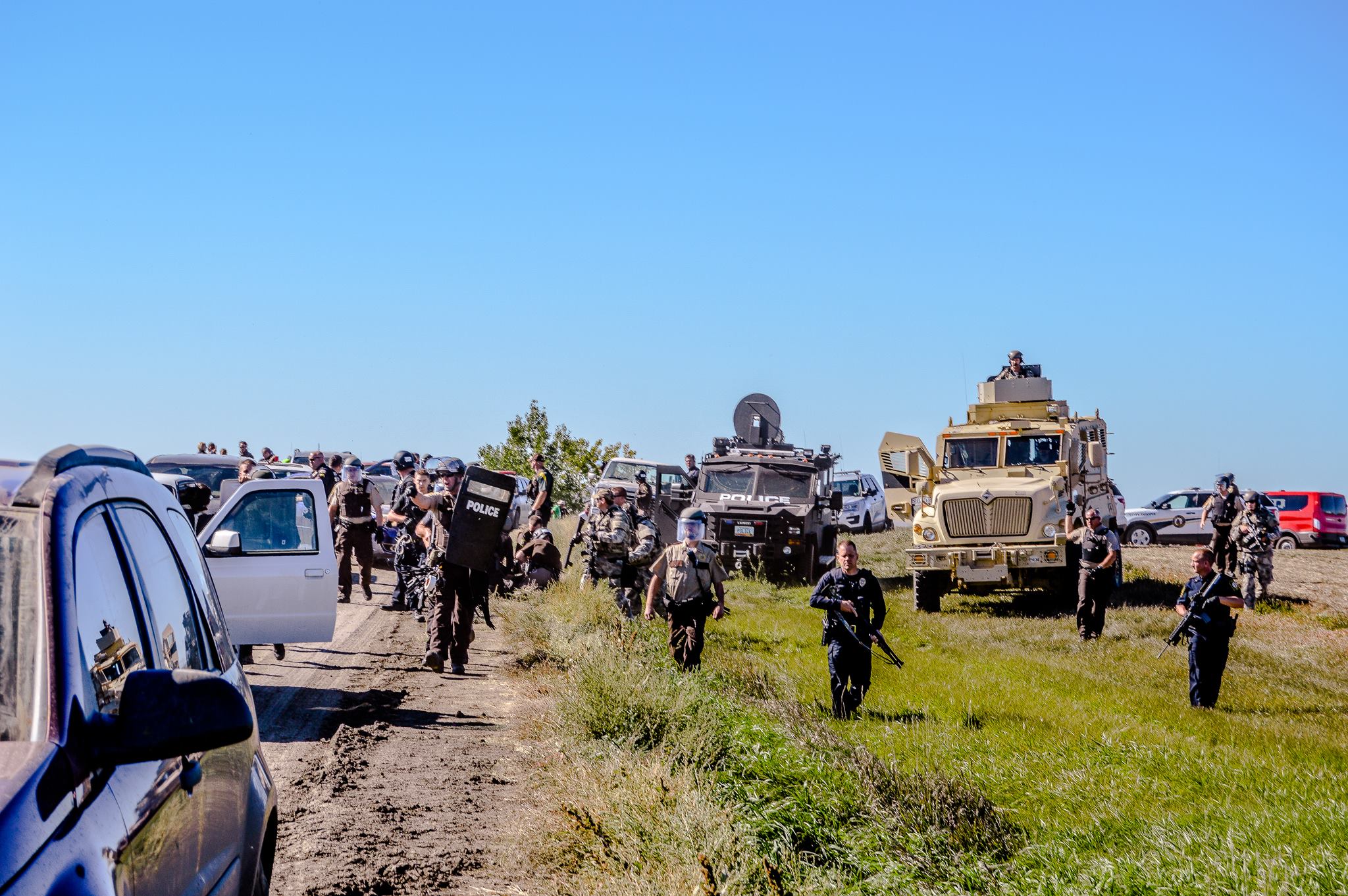 Militarized police gather against unarmed water protectors. (Photo: Courtesy Sacred Stone Camp)