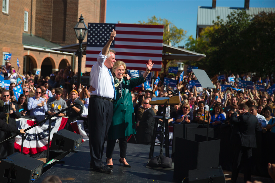 Democratic presidential candidate, former Secretary of State Hillary Rodham Clinton stands with longtime ally Virginia Gov. Terry McAuliffe during a campaign rally, Friday, Oct. 23, 2015, in Alexandria, Va. (AP Photo/Evan Vucci) 