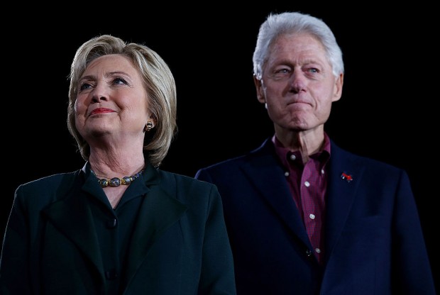 Former Secretary of State Hillary Clinton and her husband, former U.S. president Bill Clinton campaign during the primary Feb. 19, 2016 in Las Vegas, Nevada. (Justin Sullivan/Getty Images) 