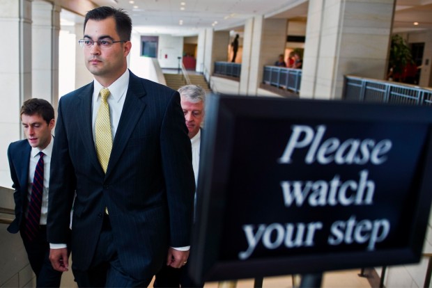 Bryan Pagliano, a former State Department employee who helped set up and maintain a private email server used by Hillary Rodham Clinton, departs Capitol Hill in Washington, Thursday, Sept. 10, 2015, to give his deposition to a House panel on the Benghazi investigation. Pagliano will assert his constitutional right not to testify before any congressional committees, his lawyer says. (AP Photo/Cliff Owen) 