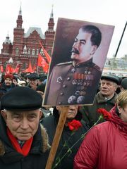 Russian communist party supporters line up to place