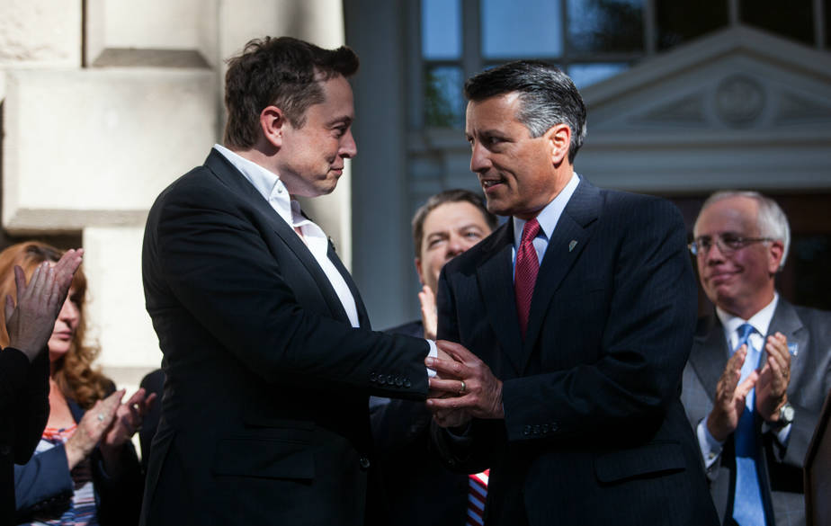 Nevada Gov. Brian Sandoval with Tesla CEO Elon Musk. Credit: Max Whittaker/Getty Images