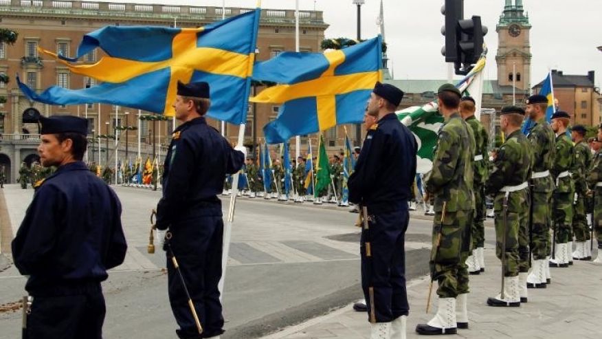 FILE -- June 18, 2010: Swedish armed forces soldiers attend a rehearsal in front of the Royal Palace in Stockholm, Sweden.