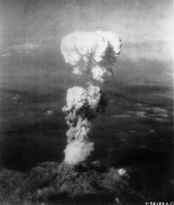 Atomic mushroom cloud rising over Hiroshima