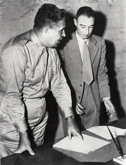 General Leslie Groves and J. Robert Oppenheimer, military and civilian heads of the Manhattan Project